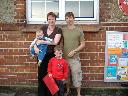 Me, mum, dad and Caleb outside the school
