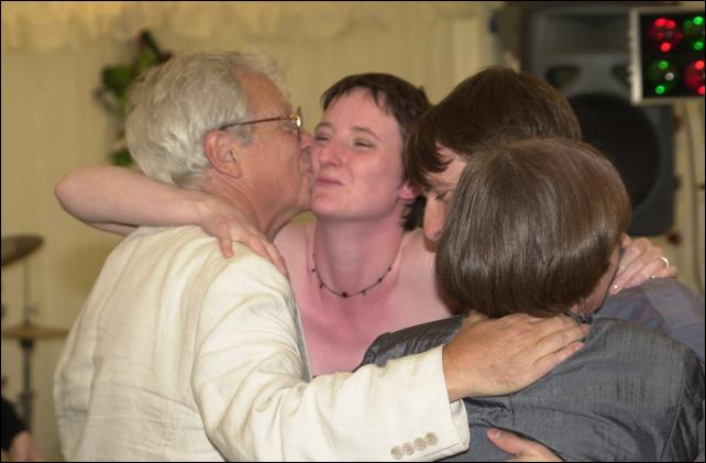 Click to see The mother of the bride about to snog her son-in-law